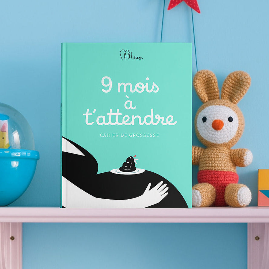 Cahier de grossesse Minus ouvert, pages illustrées et décoratives.