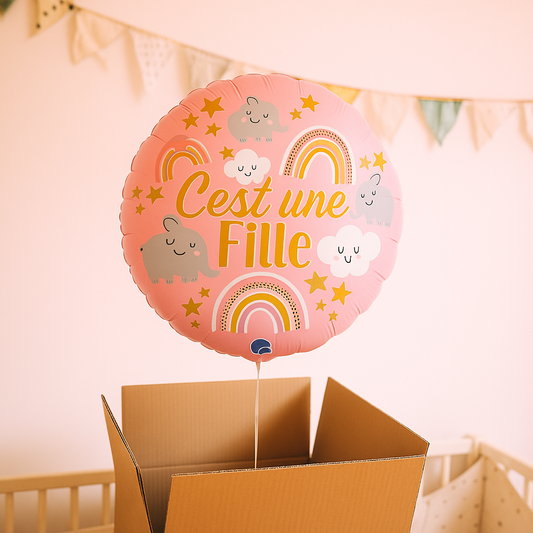 Ballon rose 'C'est une fille' avec motif élégant.