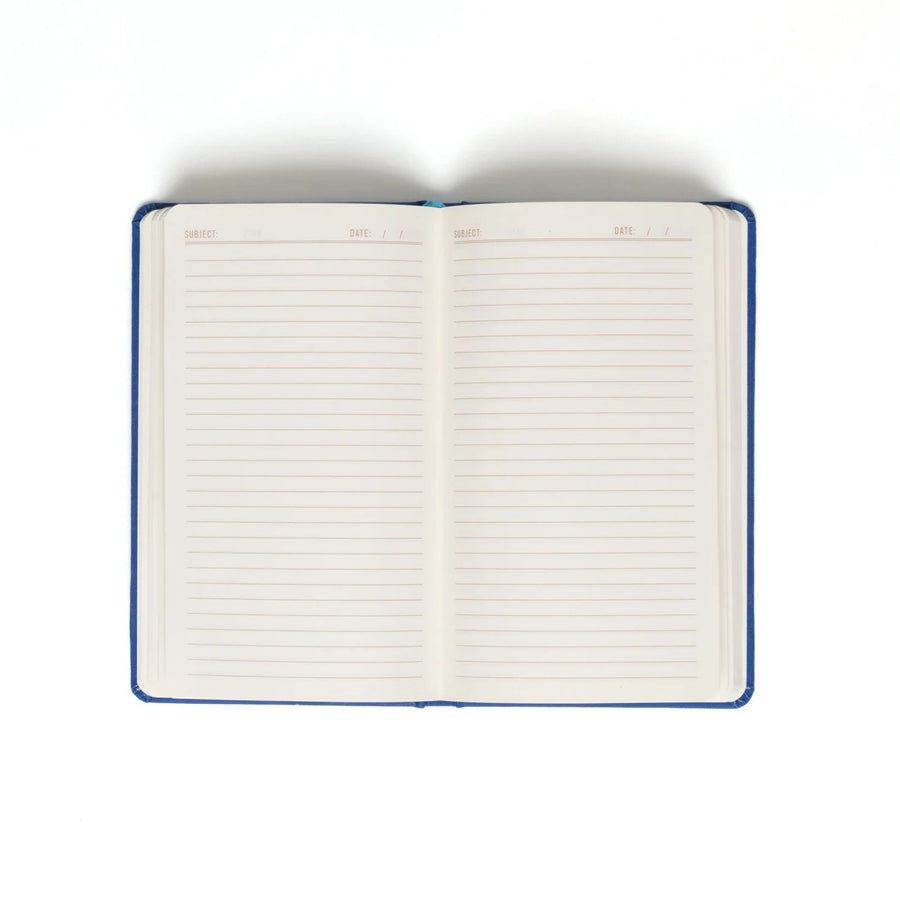 Carnet avec motifs d'yeux sur fond clair, design ludique.