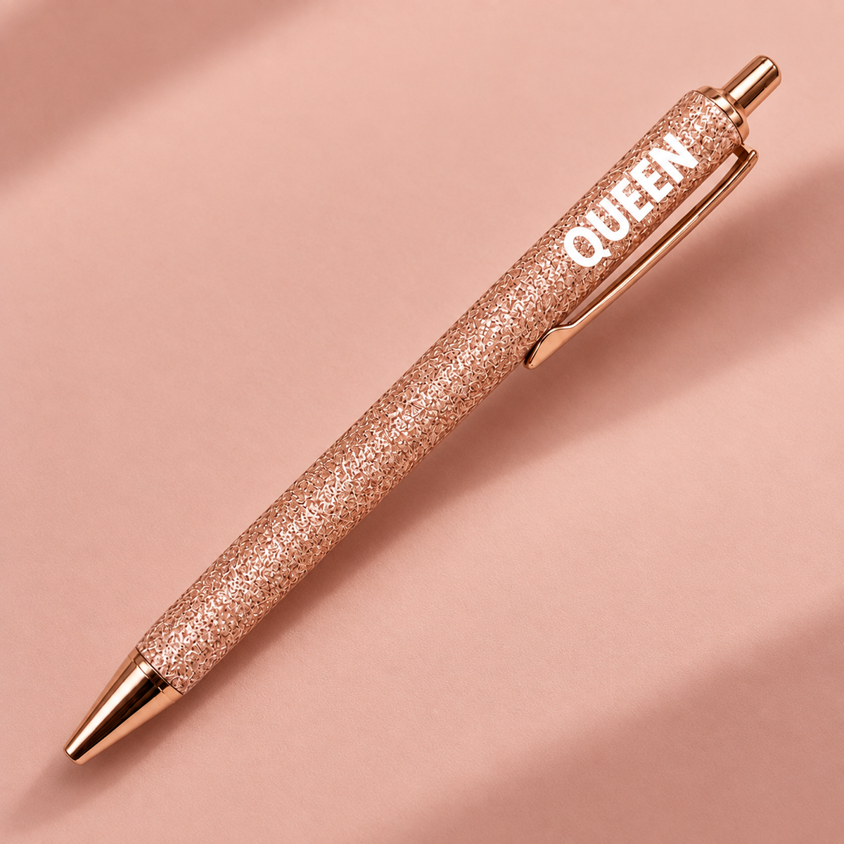Stylo à paillettes Queen avec un fini rose gold brillant