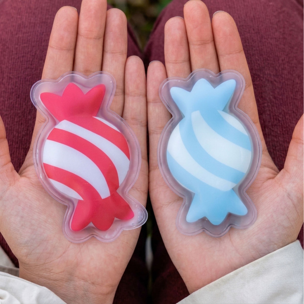 Chauffe-mains en forme de bonbons géants, vue de face