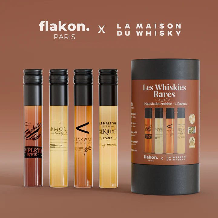 Coffret de whiskies rares avec quatre bouteilles élégantes