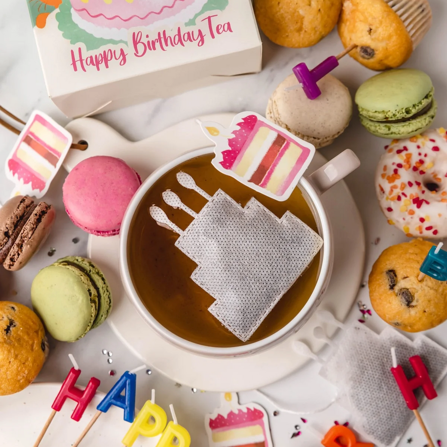 Coffret de thé élégant avec motifs floraux colorés.