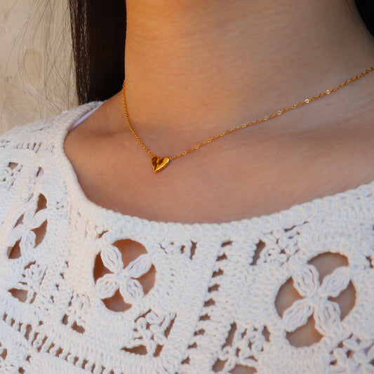 Collier en acier inoxydable avec pendentif cœur doré