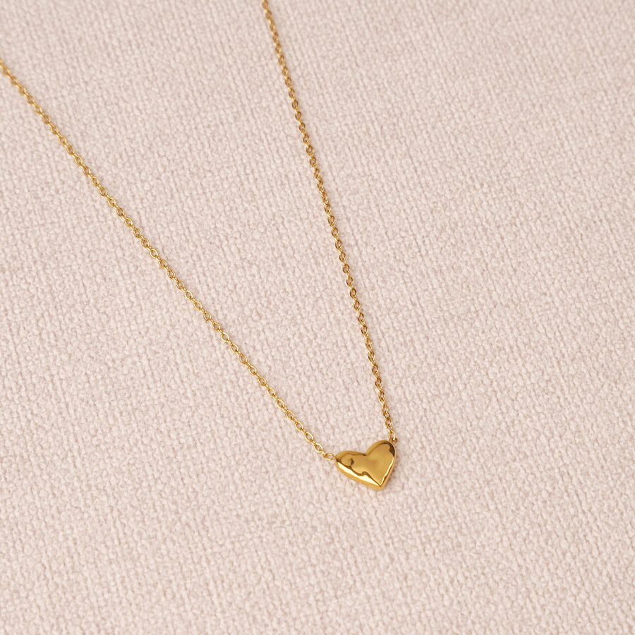 Collier en acier inoxydable avec pendentif cœur doré