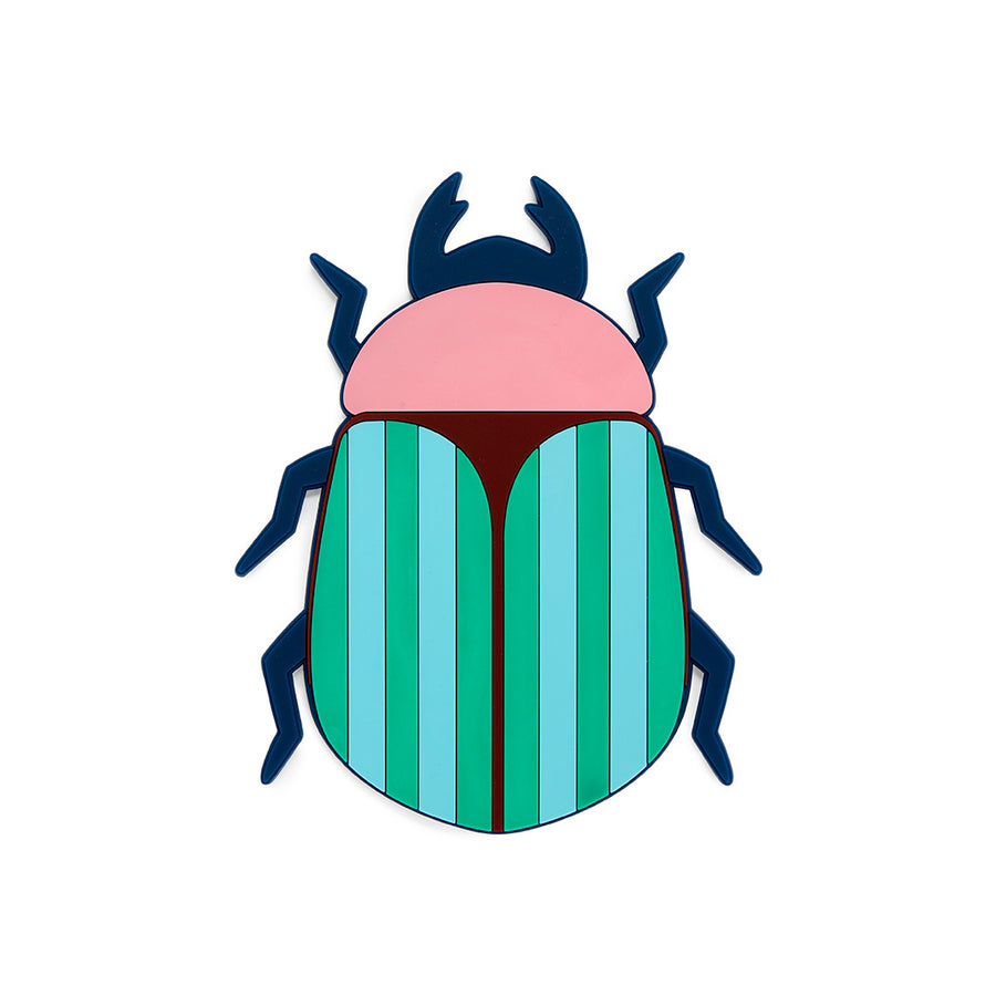 Dessous de plat en forme de scarabée avec motifs colorés.