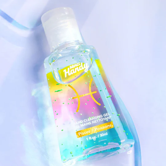 Gel pour les mains avec motif du signe Poissons en gros plan.