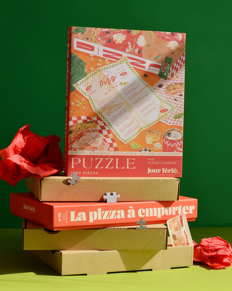 Puzzle représentant une pizza à emporter, vue de dessus.