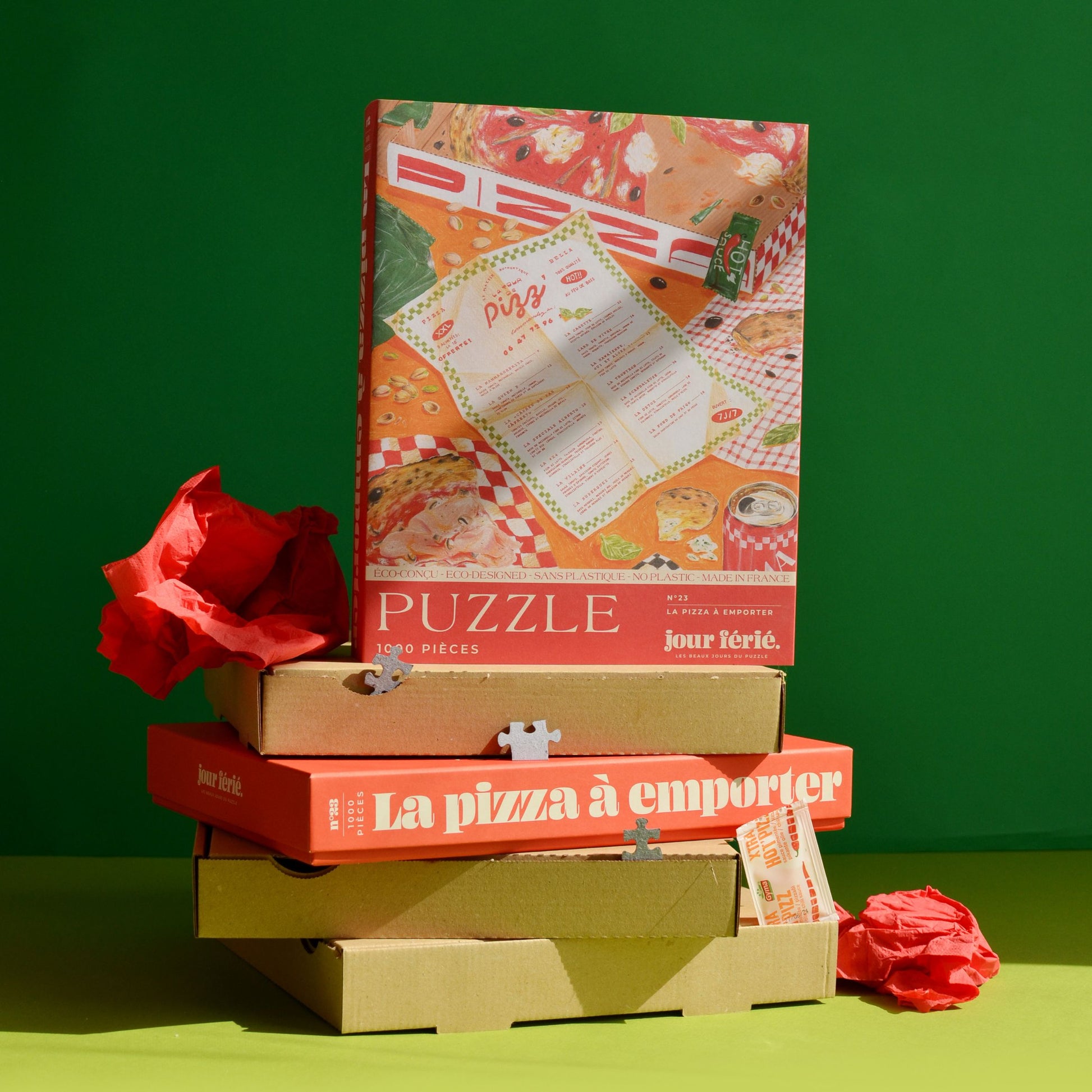 Puzzle représentant une pizza à emporter, vue de dessus.