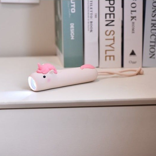 Lampe torche en silicone licorne avec détails colorés