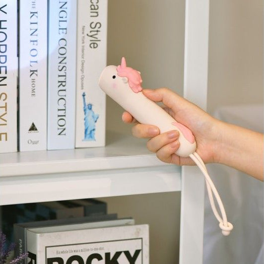 Lampe torche licorne en silicone avec un design mignon.