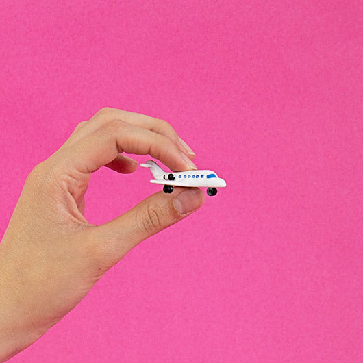 Mini jet privé de poche avec détails argentés brillants