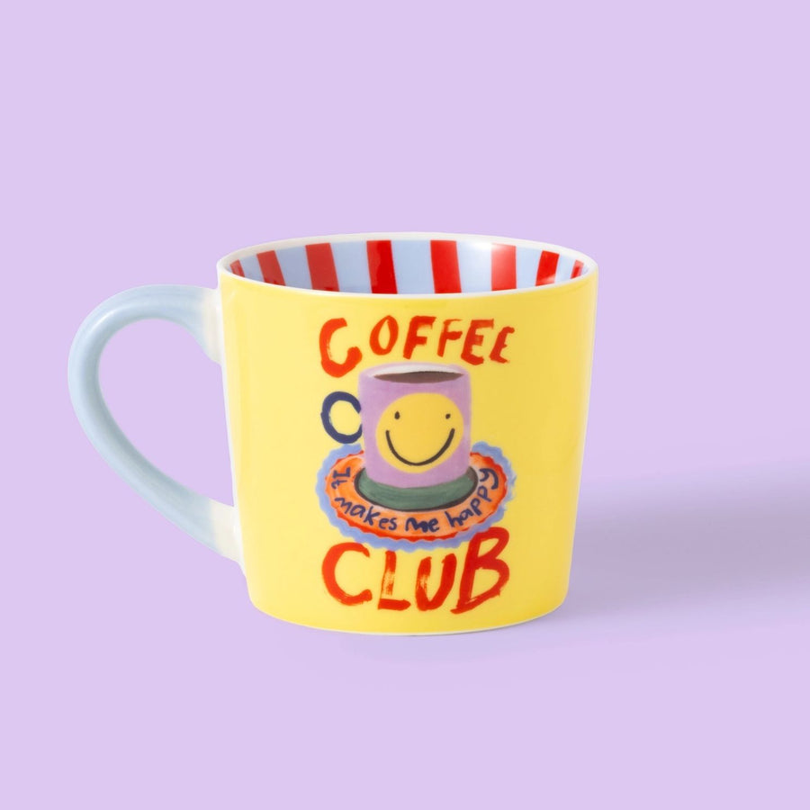 Mug Coffee Club avec message coloré et design moderne.