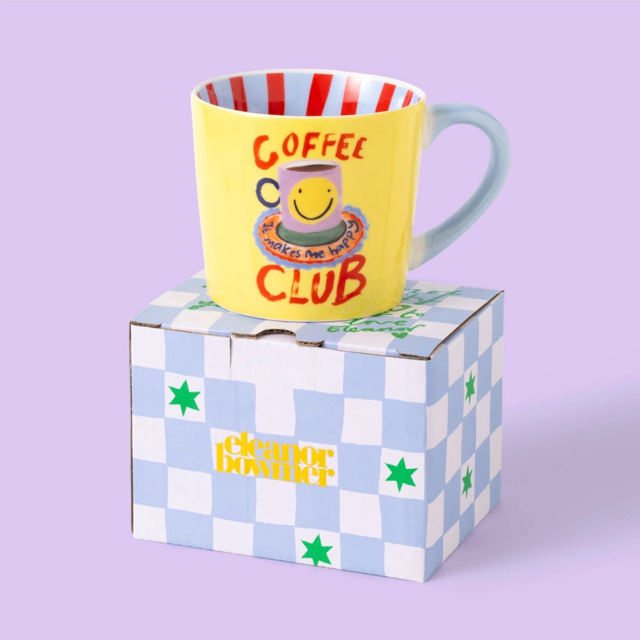 Mug Coffee Club avec message coloré sur fond blanc