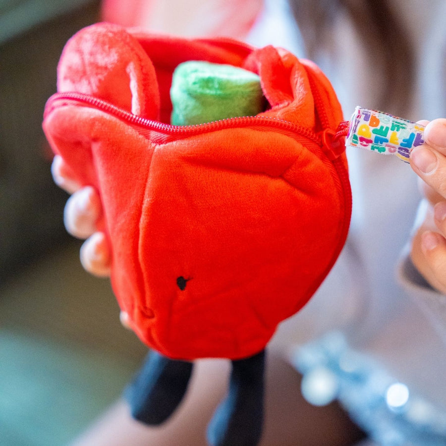 Peluche cœur et fleur, vue de côté avec zip visible