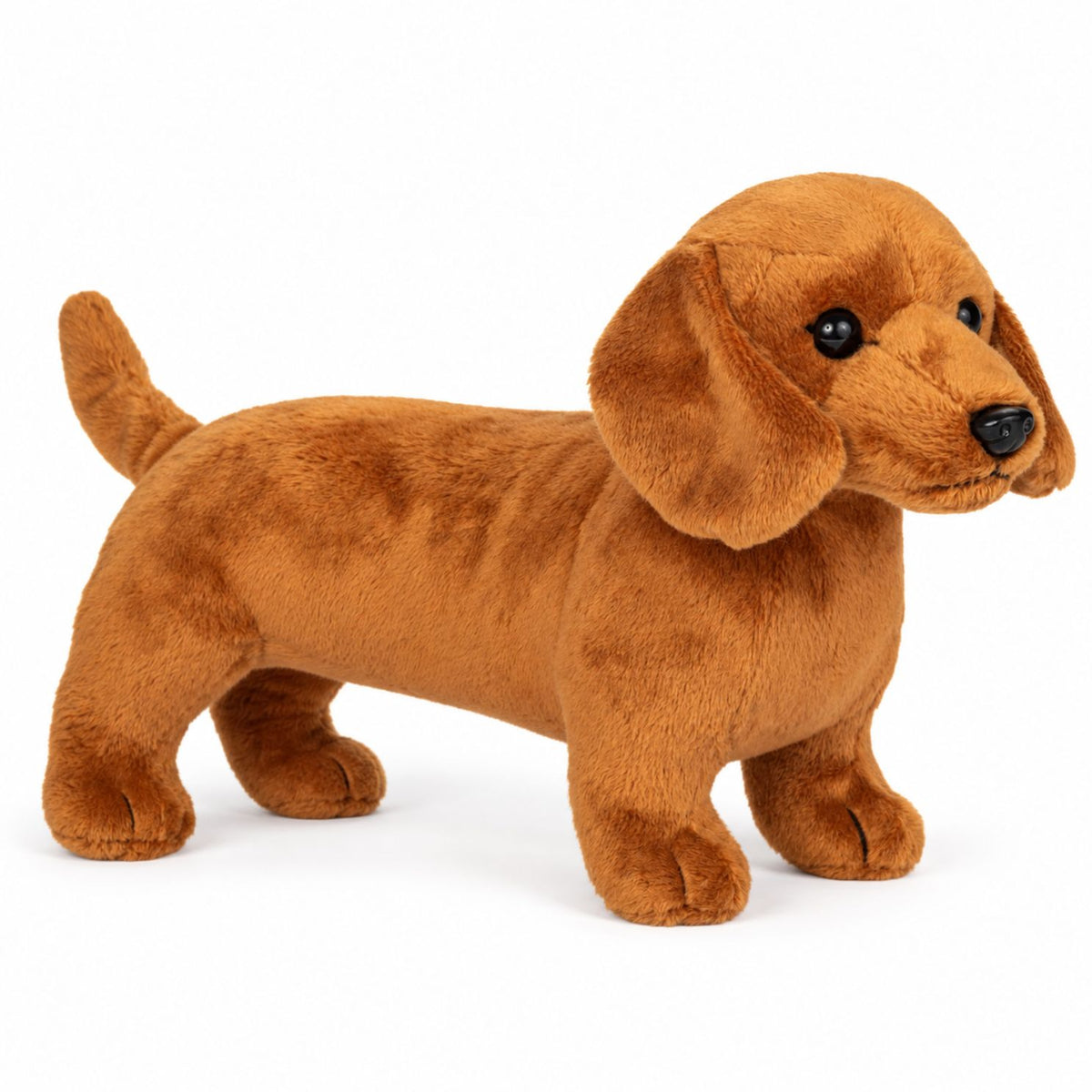 Peluche teckel en position assise, détails de la texture douce