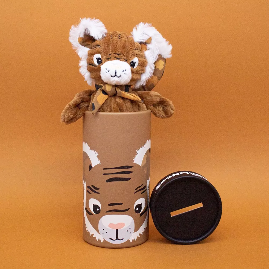 Peluche tigre avec pelage doux et regard attendrissant