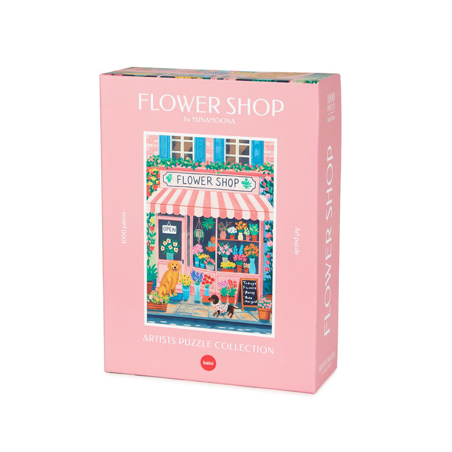 Puzzle représentant une boutique de fleurs avec volets bleus.