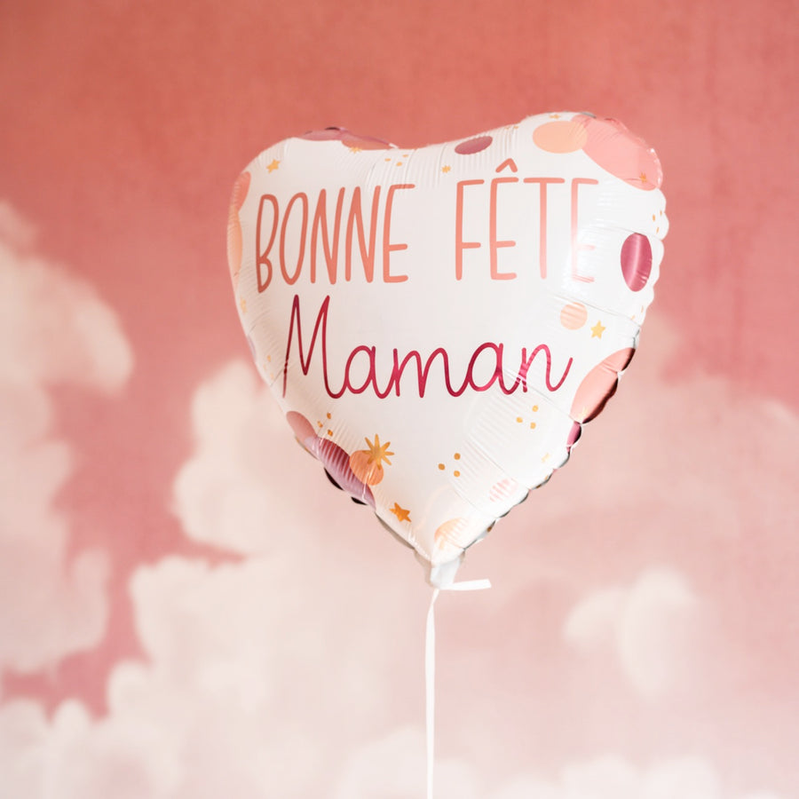 Ballon cœur 'Bonne Fête Maman' avec motif coloré et brillant.