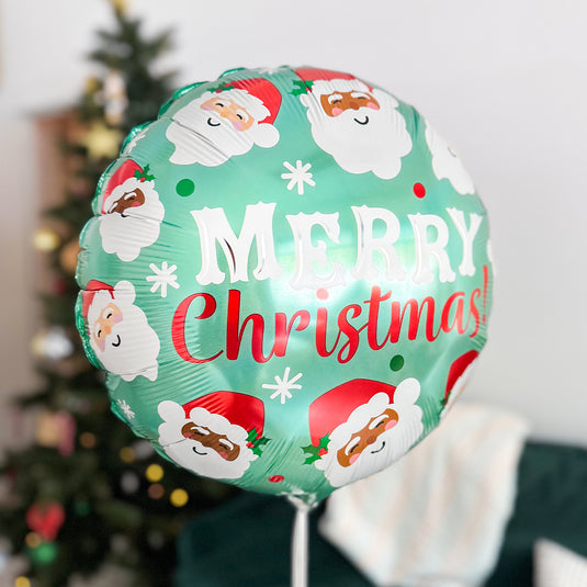 Box ballon à offrir pour noël présenté devant un sapin de noël