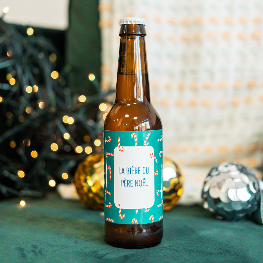 Bière Père Noël avec étiquette festive et design coloré.