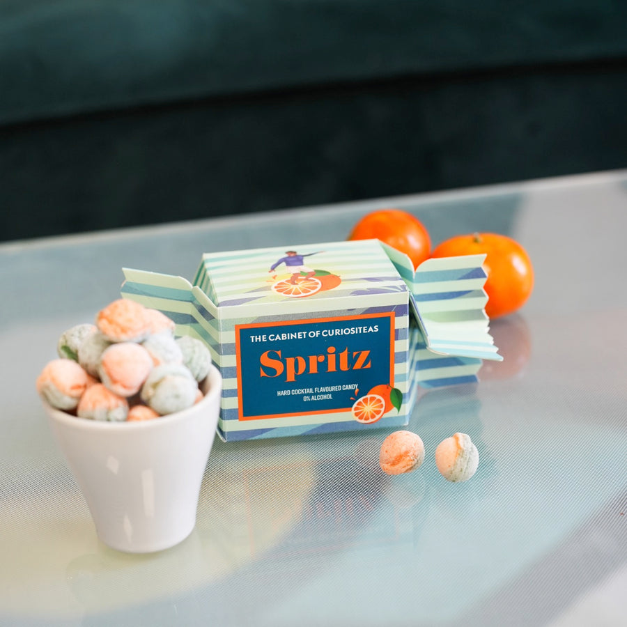 Bonbons Orange Spritz en gros plan, texture brillante et colorée.