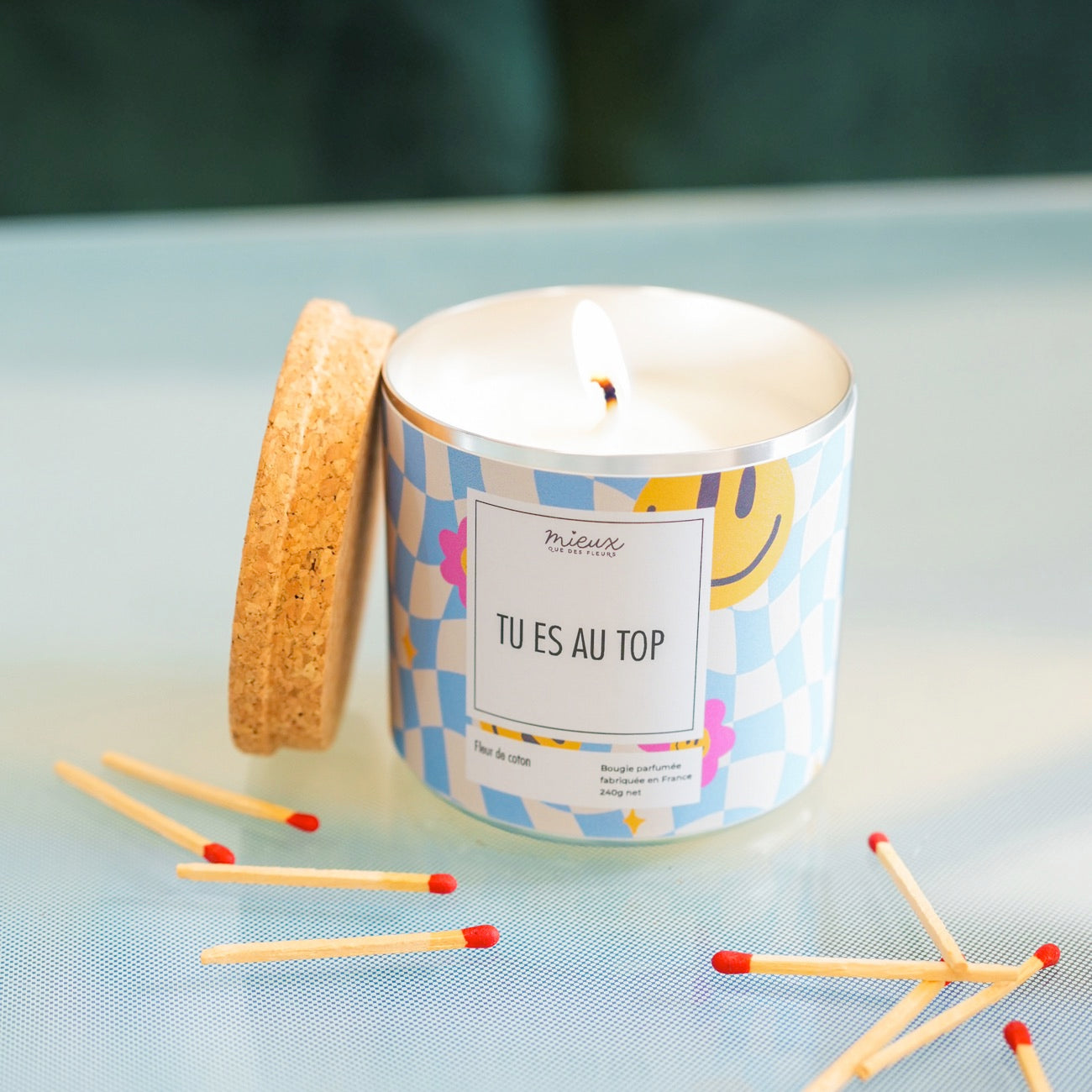 Bougie à message avec motif floral sur le verre
