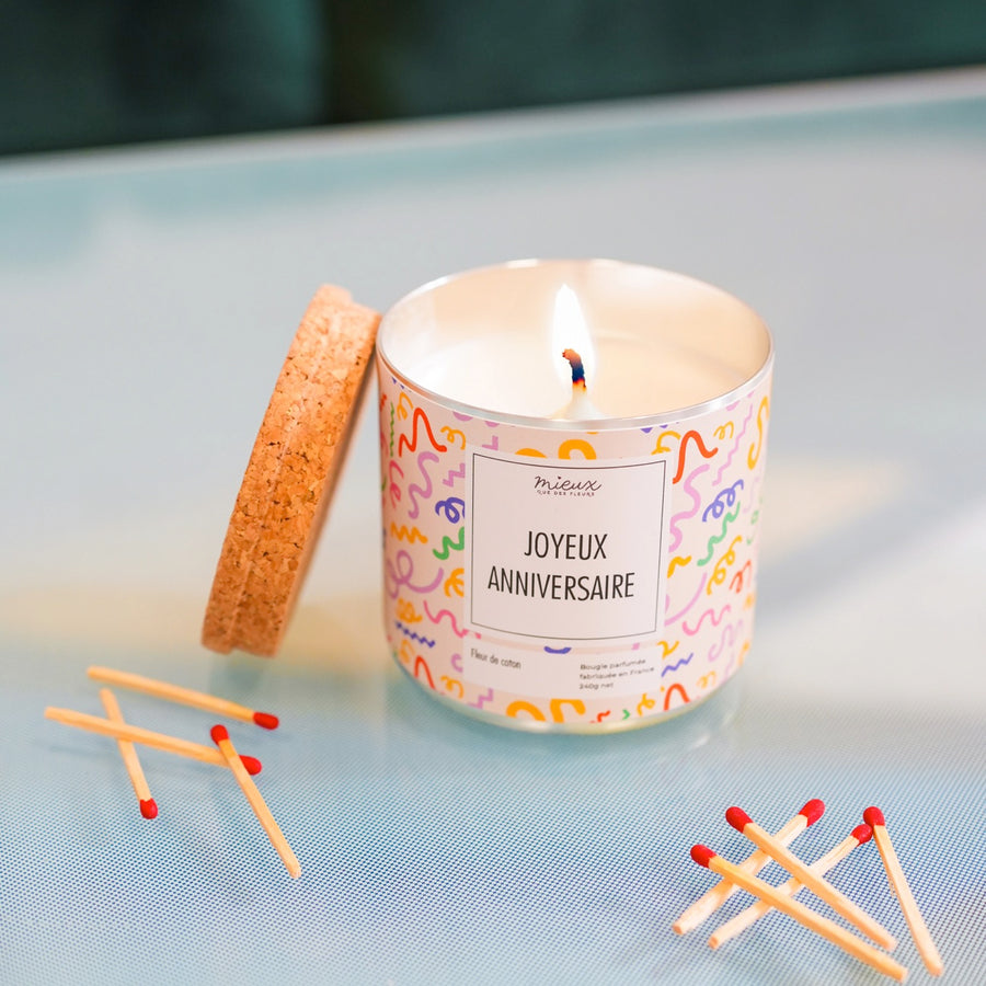 Bougie à message avec motif floral sur le verre