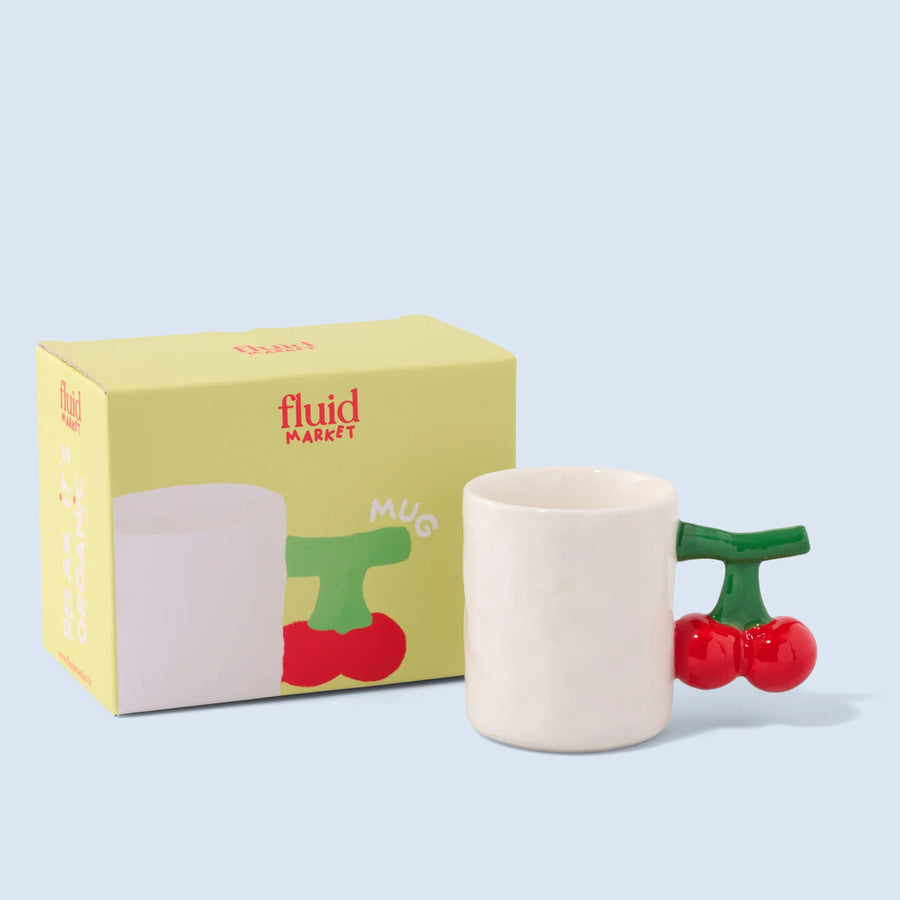 Mug en céramique avec motif cerise sur fond blanc
