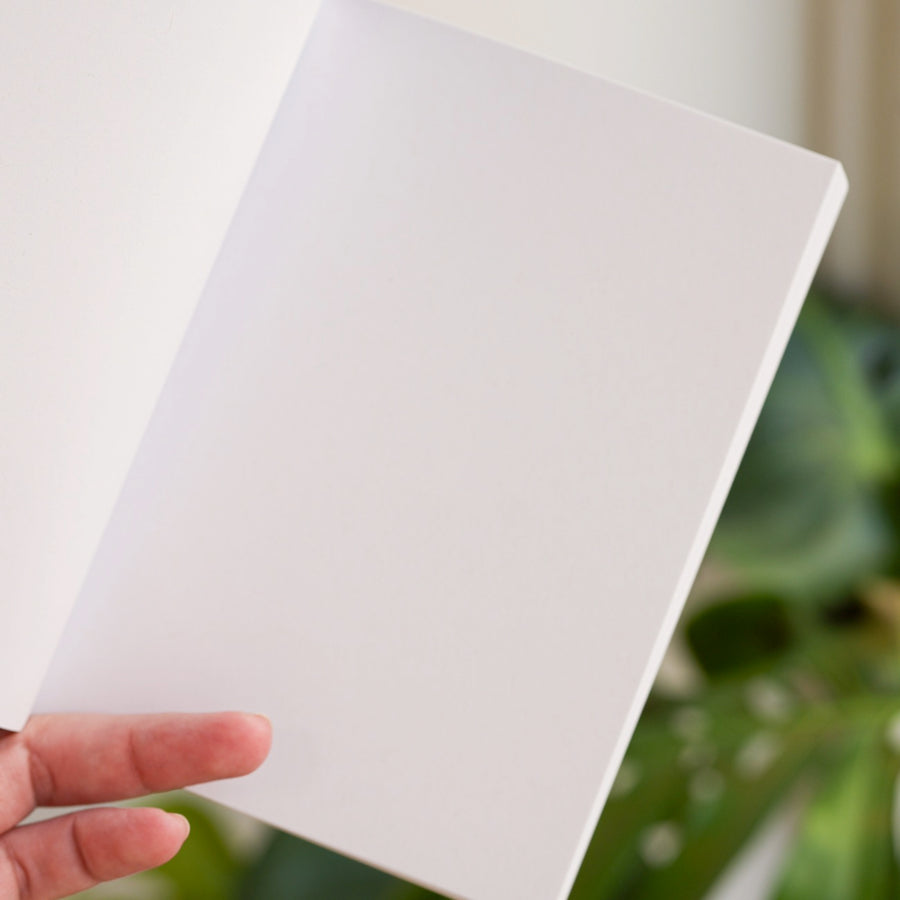 Couverture du carnet avec un design humoristique et coloré.