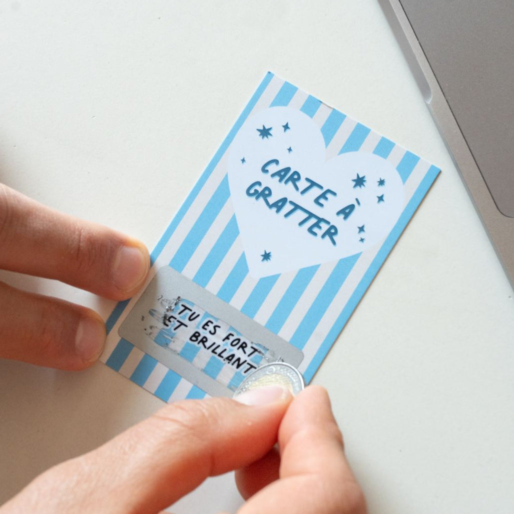 Carte à gratter avec message positif sur fond coloré