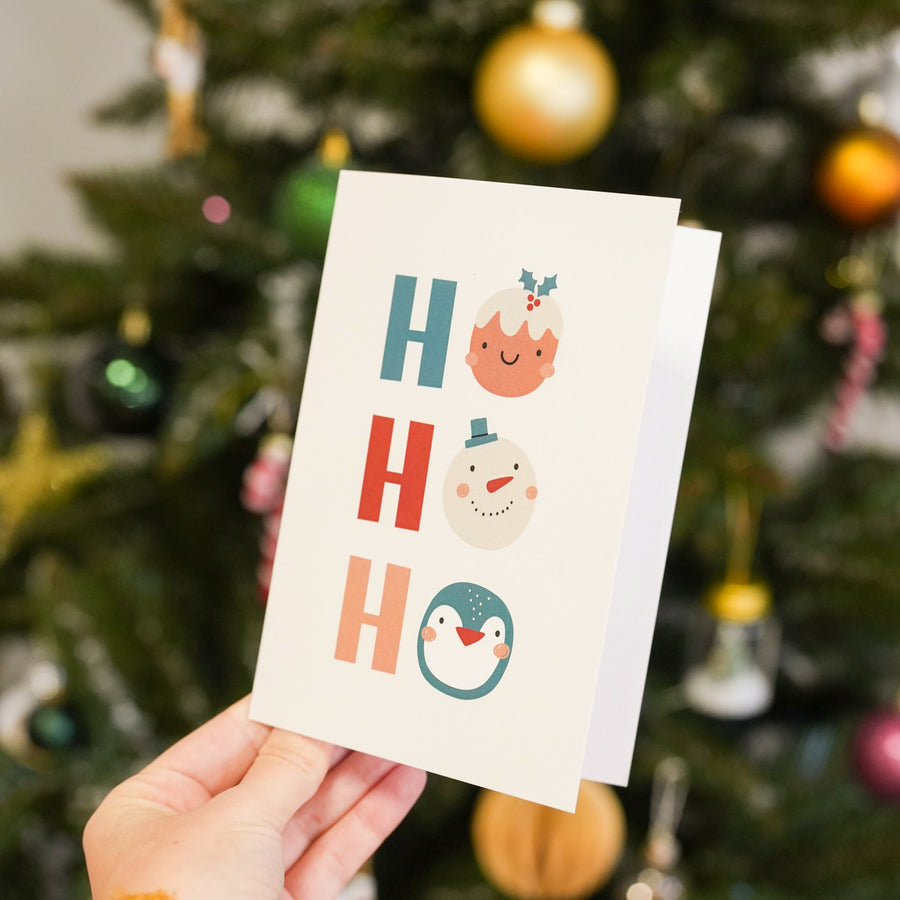 Carte de Noël avec motif givré et texte 'Ho Ho Ho'