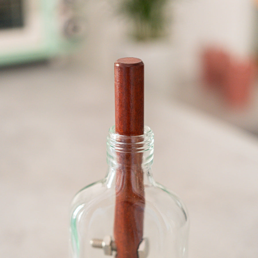 Casse-tête en forme de cigare avec bille en mouvement