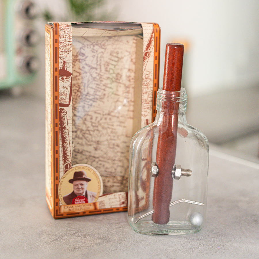 Casse-tête en forme de cigare avec bille en mouvement