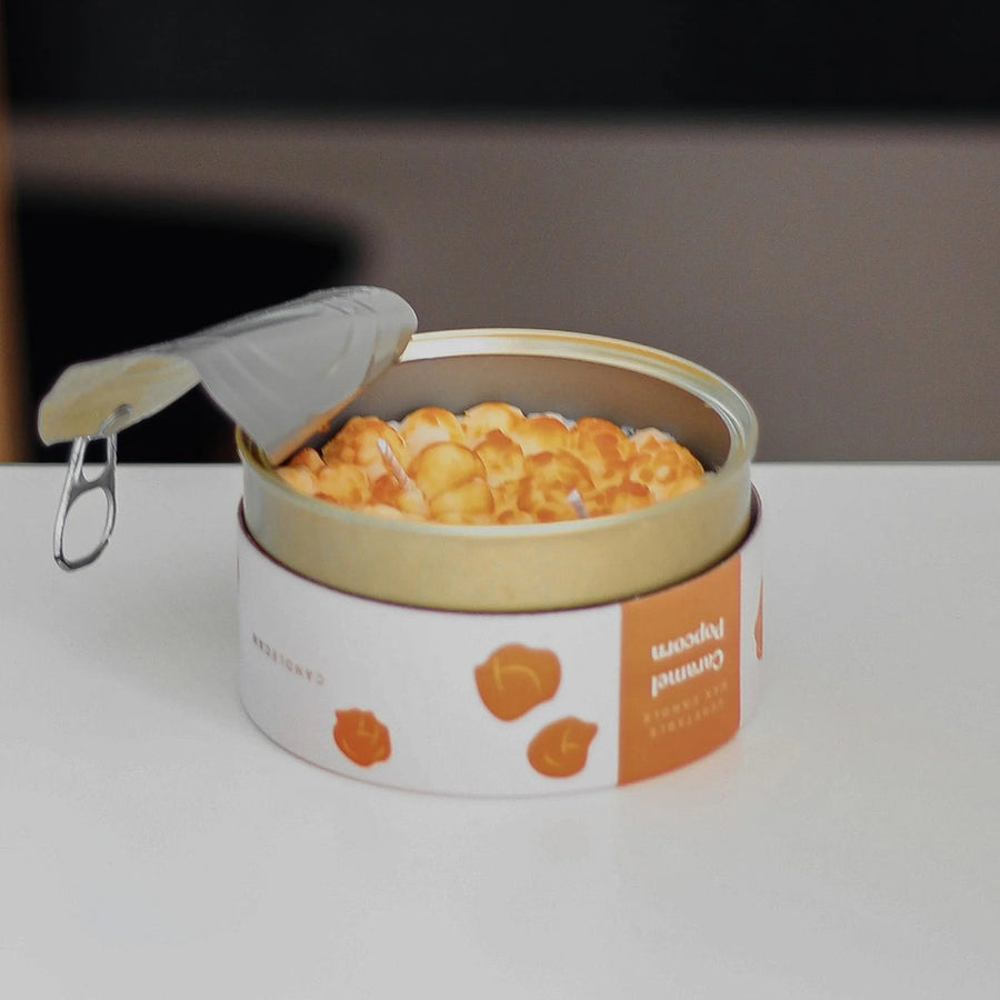 Bougie en forme de bol de pop-corn avec effet caramel