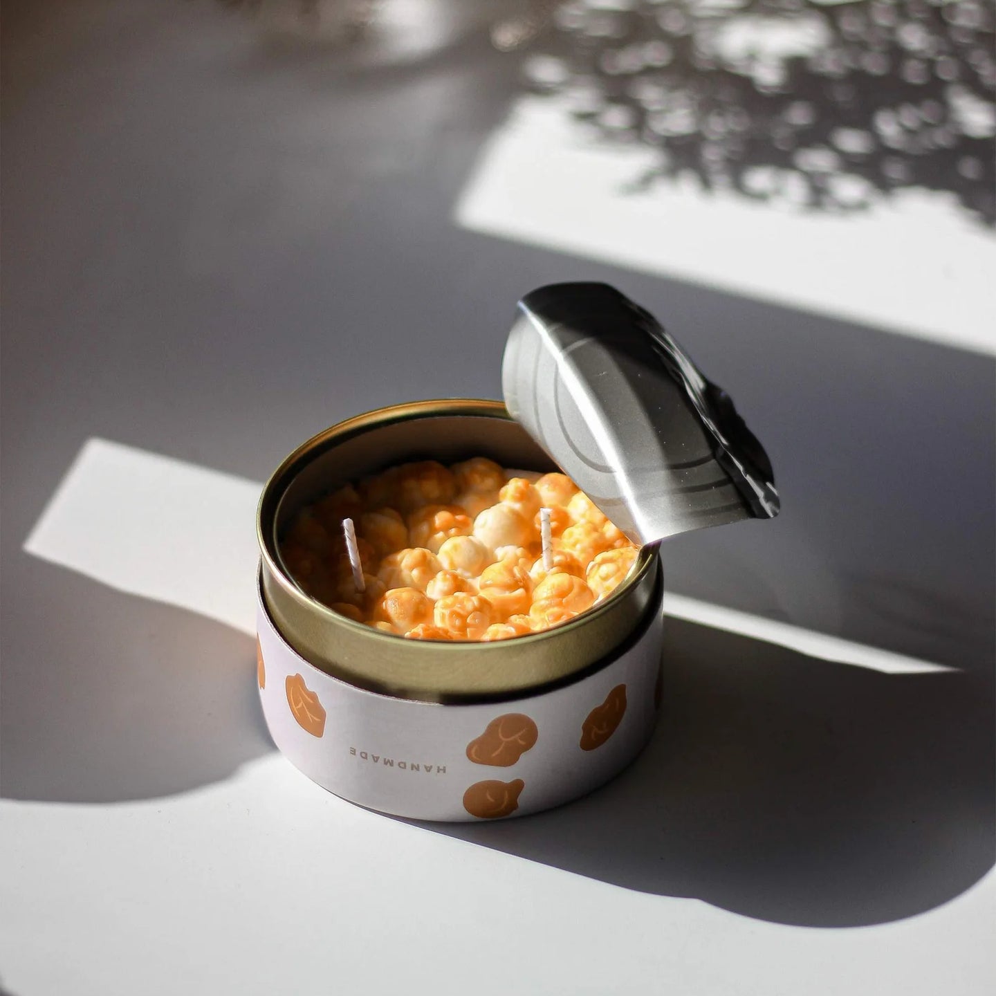 Bougie en forme de bol de pop-corn avec texture réaliste