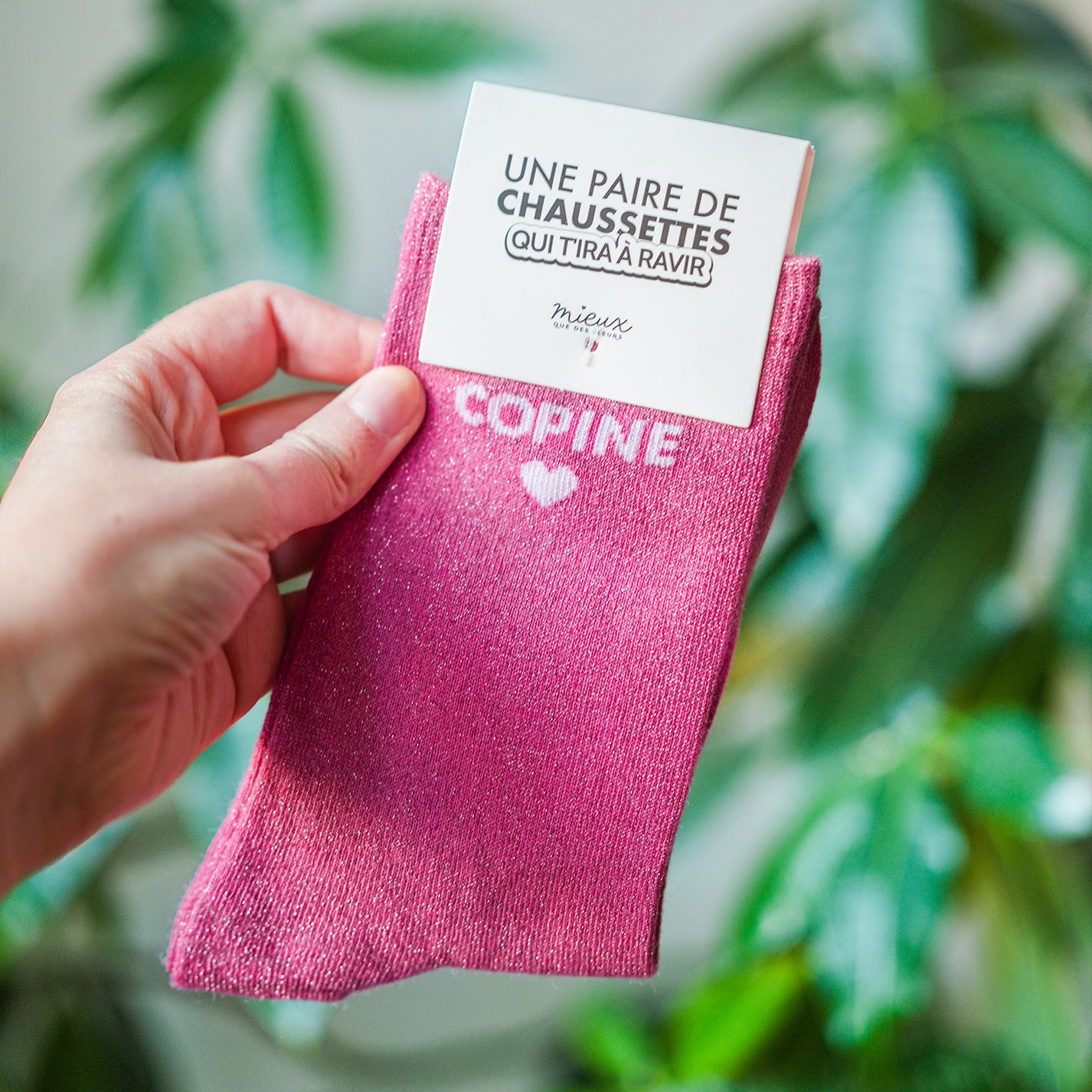 Chaussettes à paillettes avec motif amitié, vue de face.