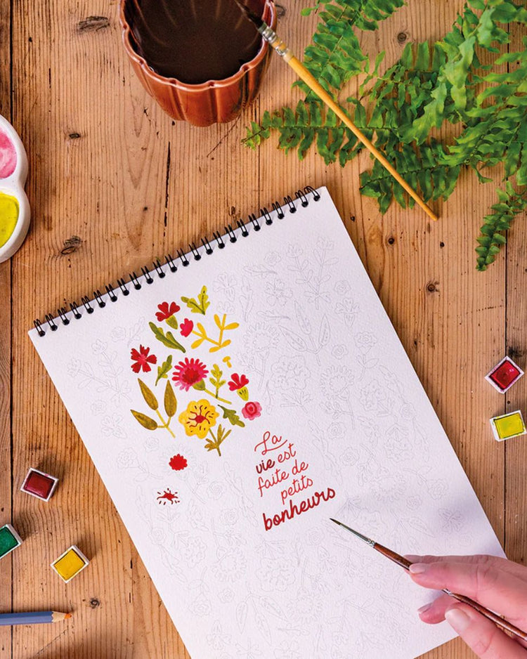 Carnet de coloriage avec motifs apaisants et colorés.