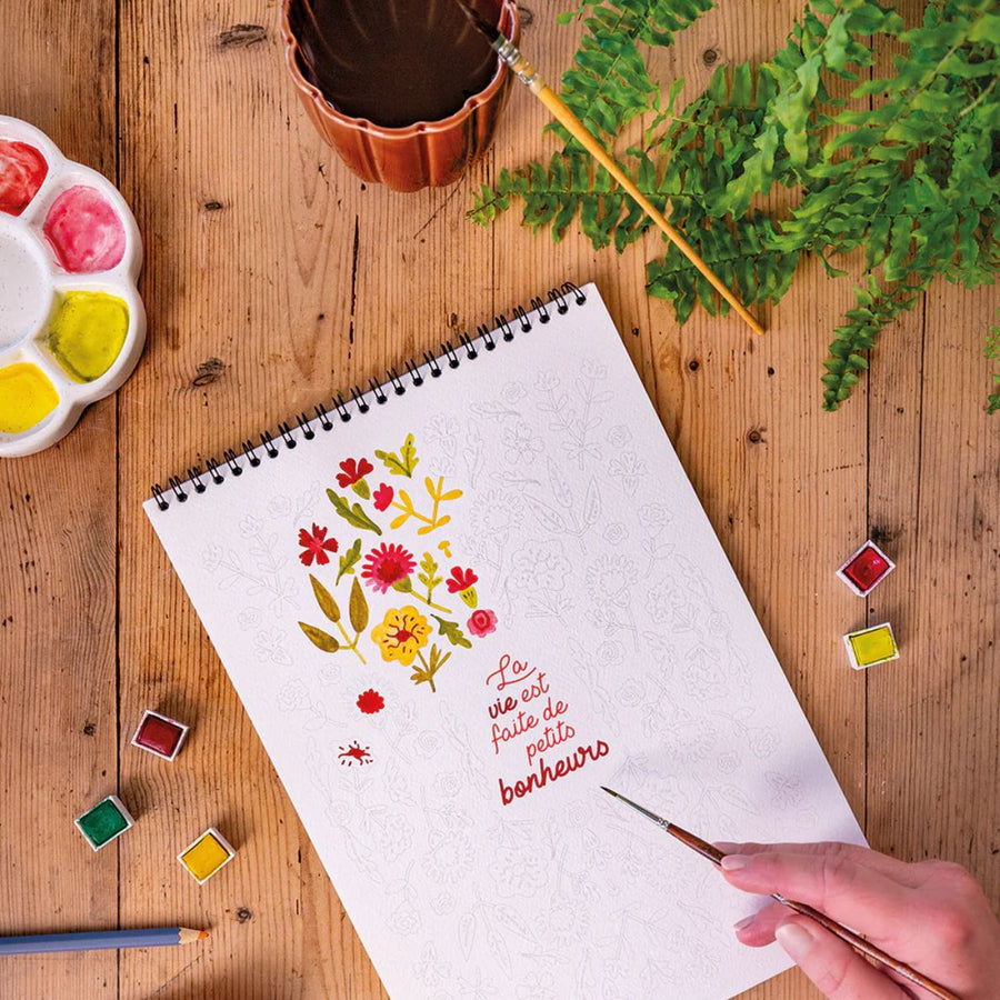 Carnet de coloriage avec motifs apaisants et colorés.