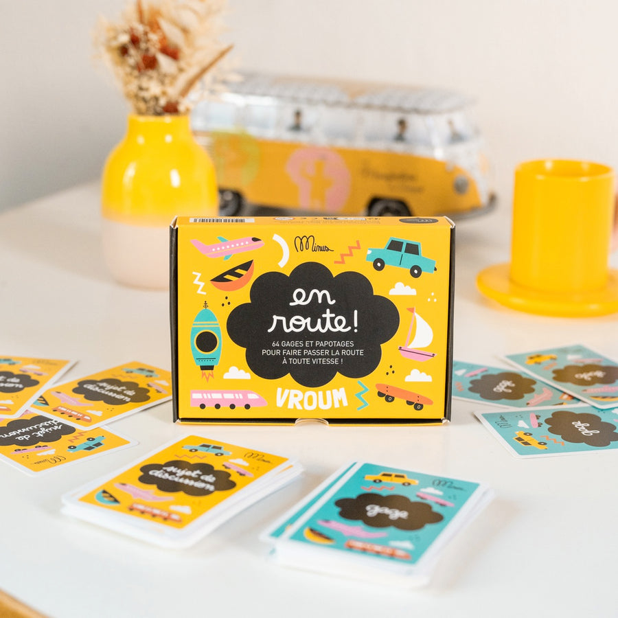 Boîte du jeu 'En route!' avec illustrations colorées.