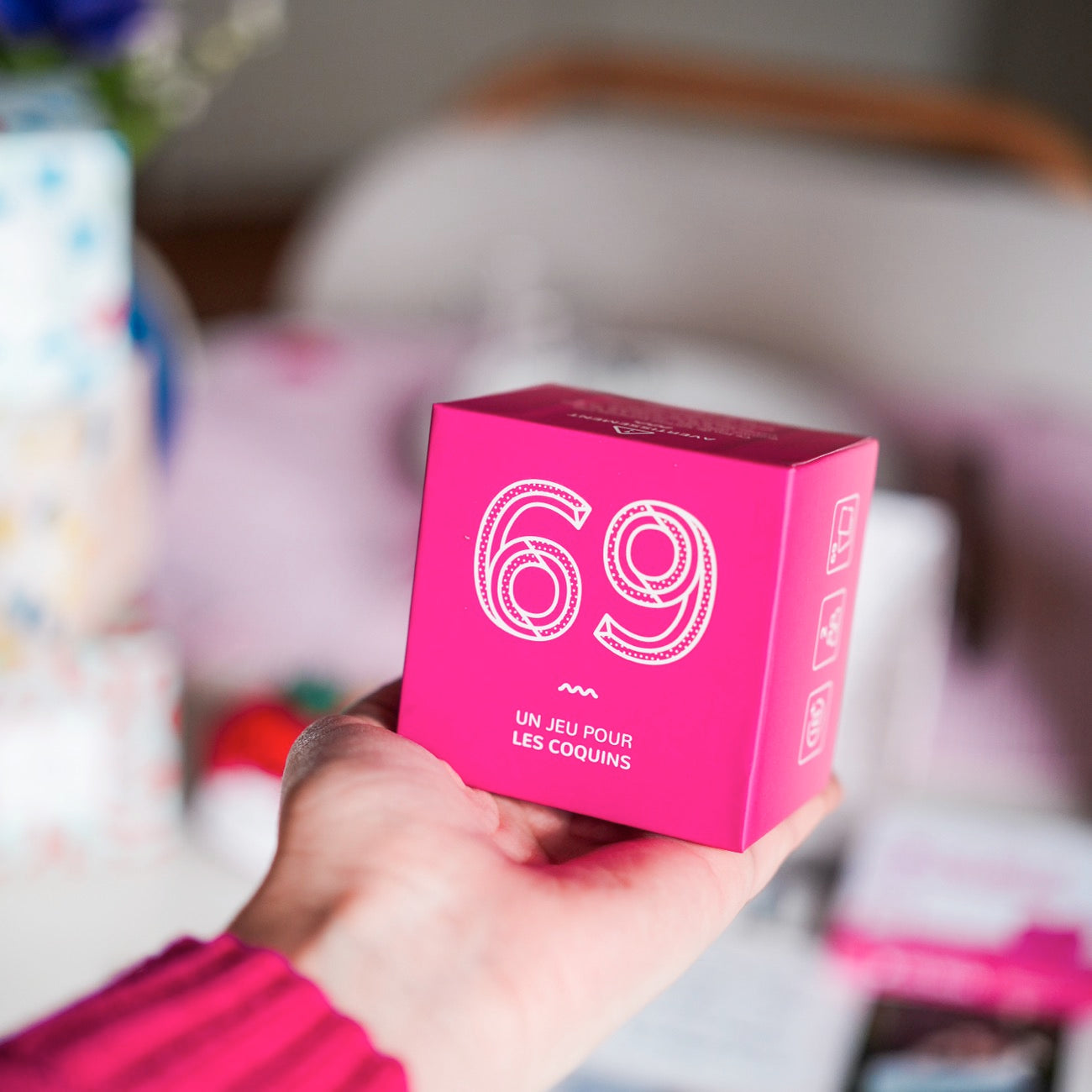 Jeu de société érotique 69 avec cartes colorées et design séduisant.