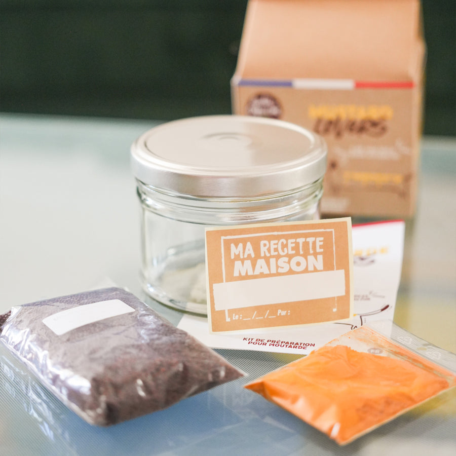 Kit DIY pour moutarde avec épices bio et instructions claires.