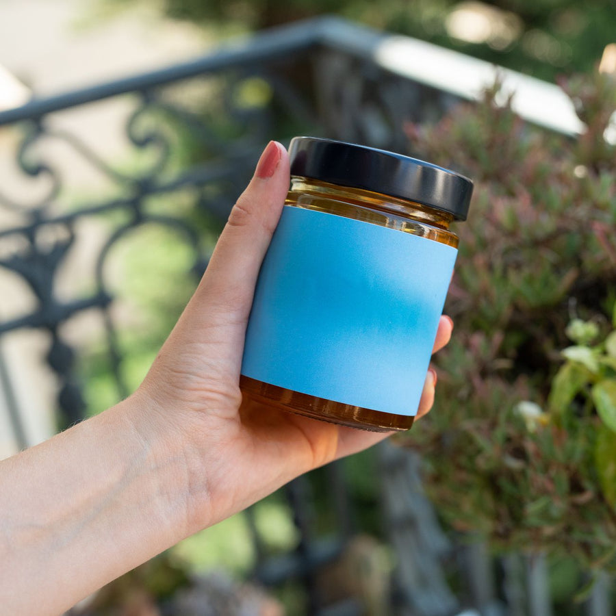 Pot de miel artisanal avec étiquette 'Un Papy comme toi'