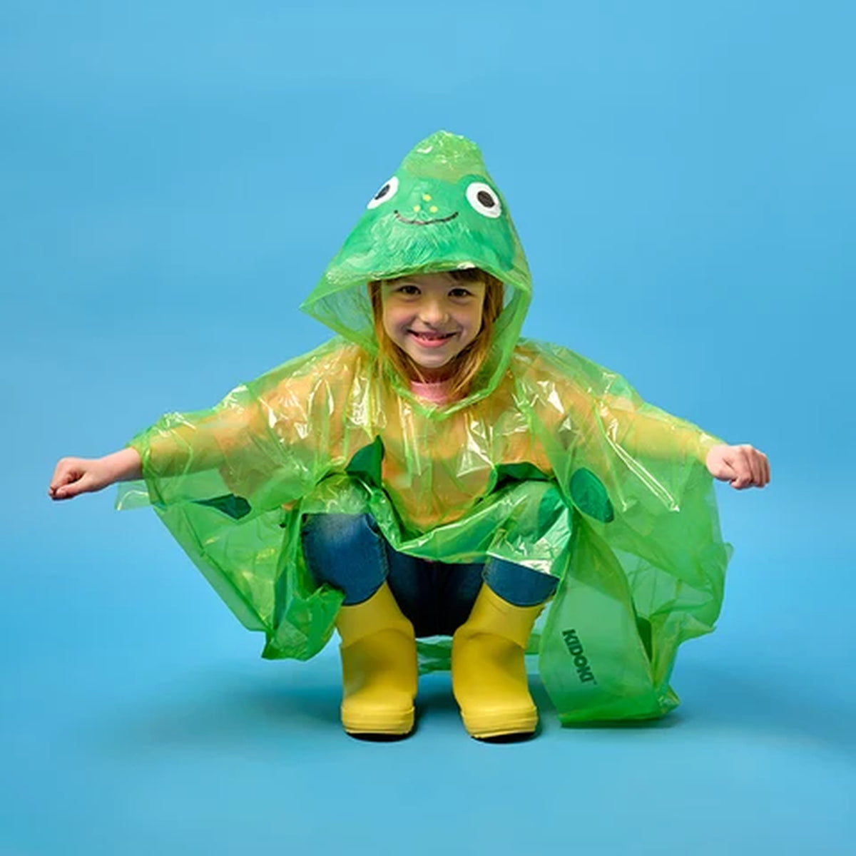 Poncho de pluie avec motif animalier, porté sous la pluie