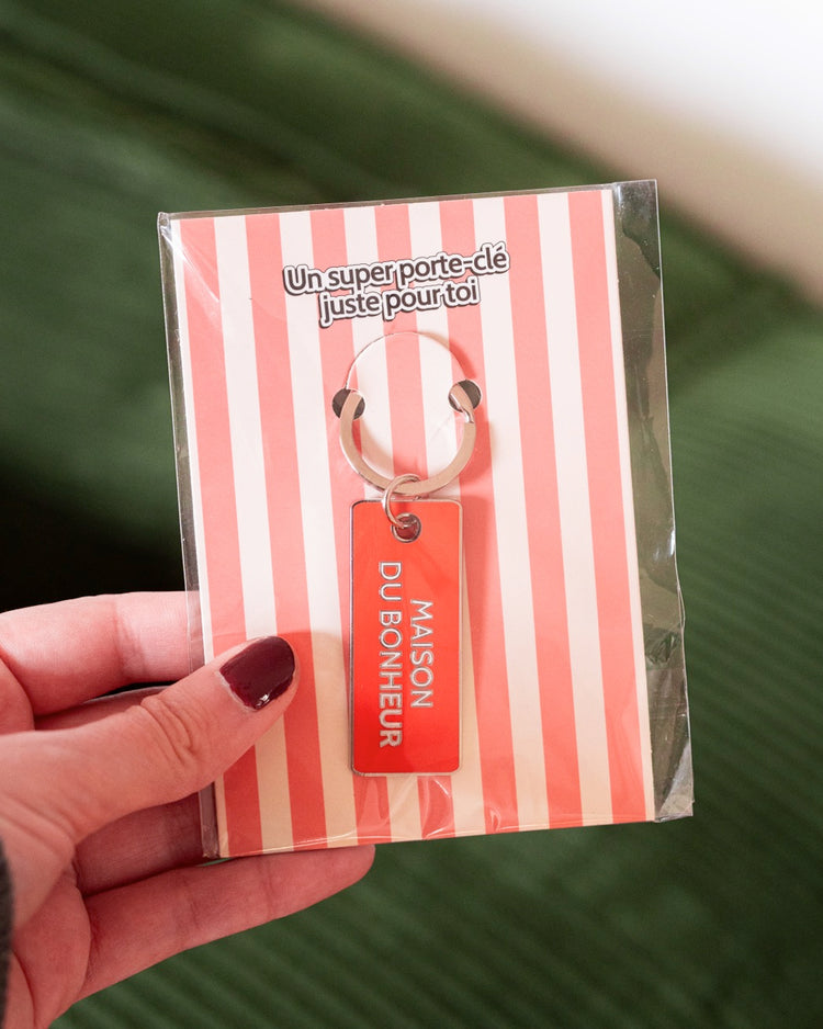 Porte-clé en forme de maison avec détails en relief