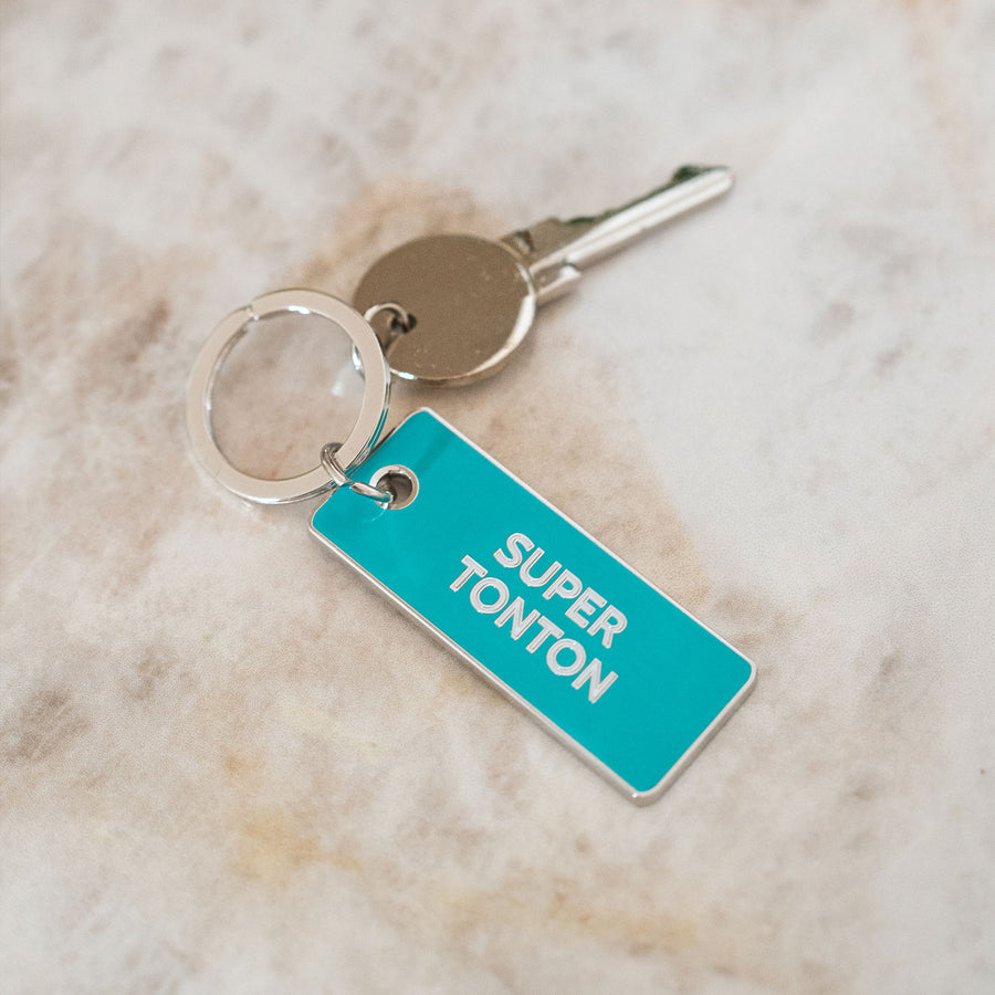 Porte-clé Super Tonton avec un design humoristique