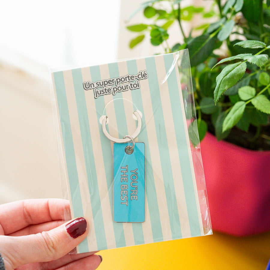 Porte-clé 'You're the Best' avec design coloré et texte en relief.