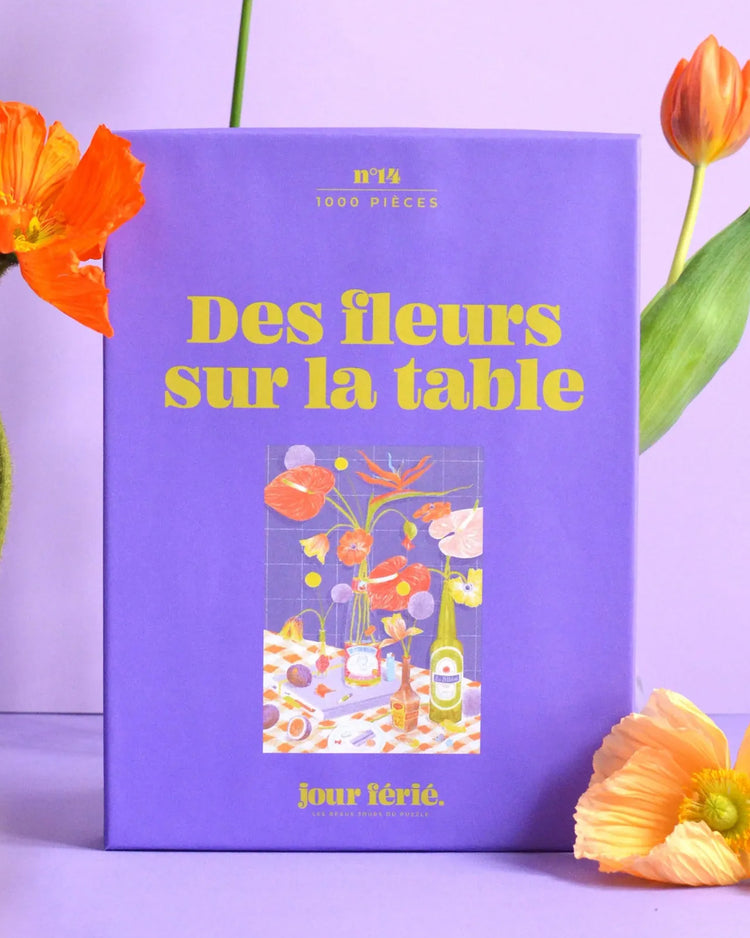 Puzzle 500 pièces avec des fleurs colorées sur une table en bois