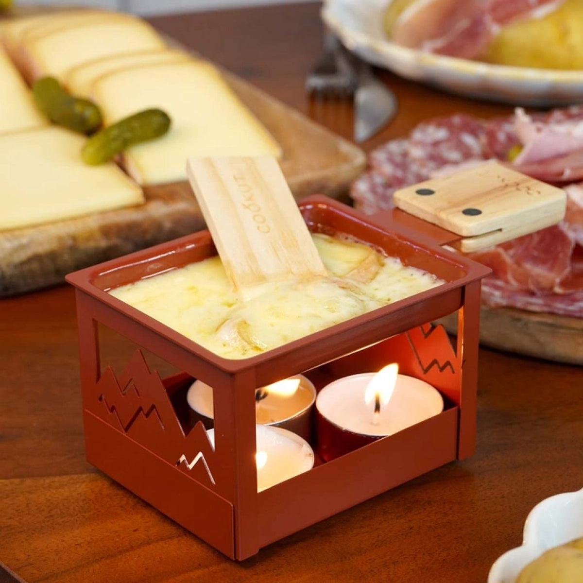 Raclette nomade pliée, prête à être transportée en extérieur