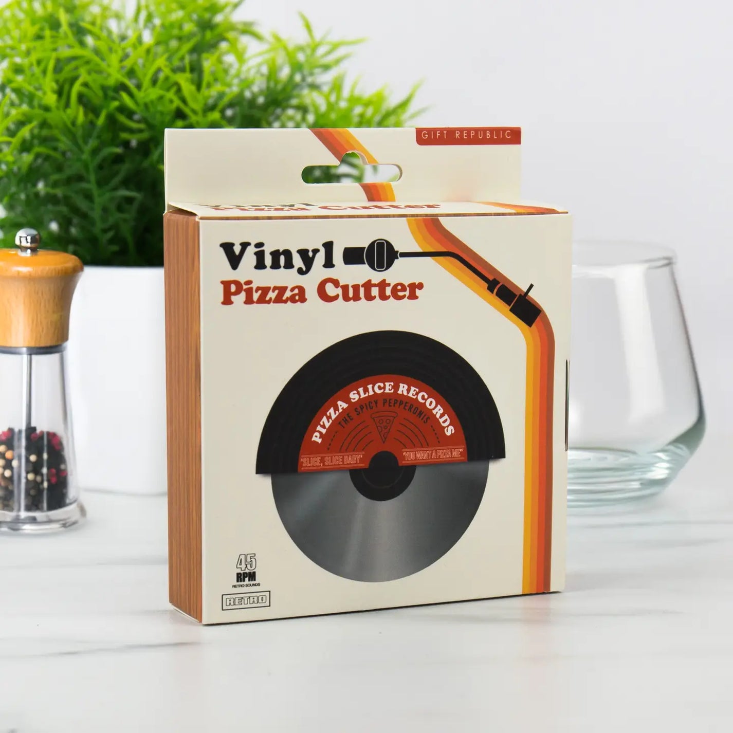 Roulette à pizza vinyle avec motif de disque sur la poignée